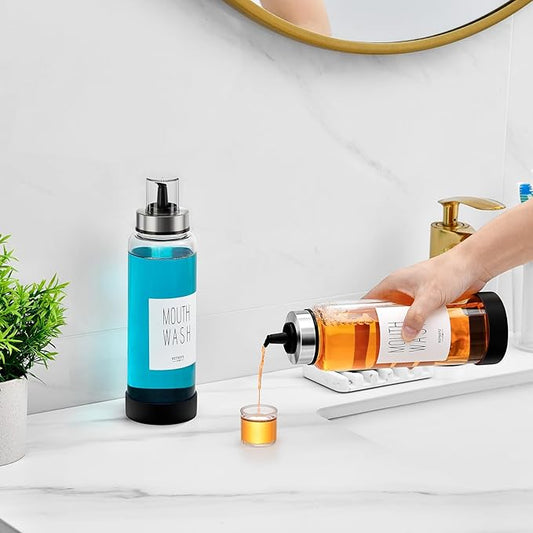 VITVITI Mouthwash Dispenser for Bathroom, Glass Mouth Wash Container with Cup Lid, 17OZ Clear Refillable Mouthwash Bottle Decanter with Silicone Pad/Labels, Set of 2