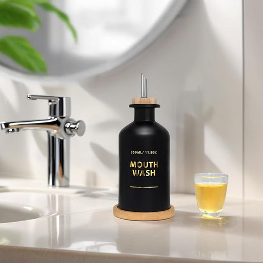 Mouthwash Dispenser for Bathroom 11.8oz – Glass Mouthwash Bottle with Cup & Bamboo Tray, Gold Hot-Stamped Lettering, Silicone Base, Modern Bathroom Accessory (Black)