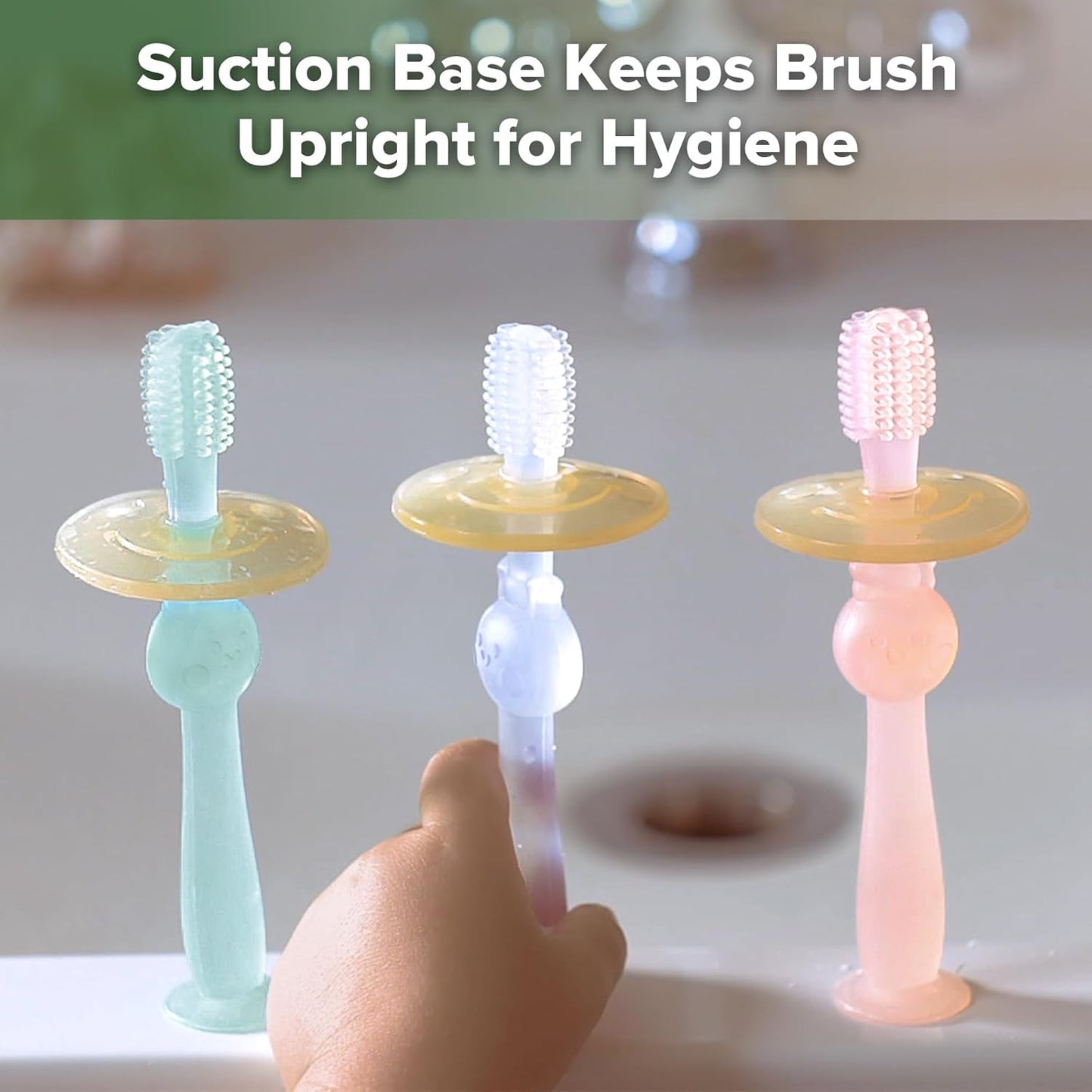 haakaa 360° Baby Toothbrush with Suction Base - Gentle Cleaning for Toddler's Self-Brushing Training, Food-Grade Silicone, Adjustable Safety Shield - Pink (1 Piece)