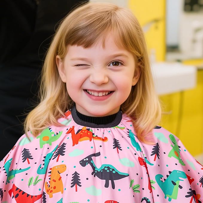 Gealaek Kids Haircut Cape and Comb Set Professional Barber Haircombs and Girls Dinosaur Hairdresser Apron with Adjustable Closure 55x40 Inches Salon Kit (Pink)