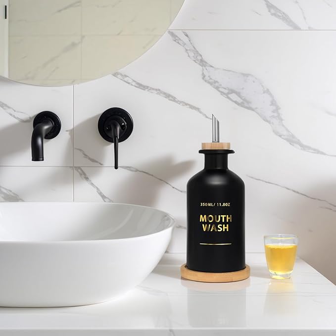 Mouthwash Dispenser for Bathroom 11.8oz – Glass Mouthwash Bottle with Cup & Bamboo Tray, Gold Hot-Stamped Lettering, Silicone Base, Modern Bathroom Accessory (Black)