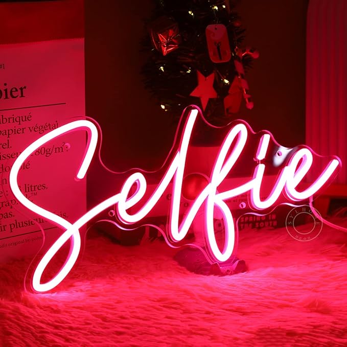 SYLHOME Selfie Pink LED Neon Light Sign Cute Makeup Girls Bedroom Light Up Mirror Wall Decor Sign Photo Studio Boys Kids Room Birthday Party Decor USB 15.2" X 7.1"