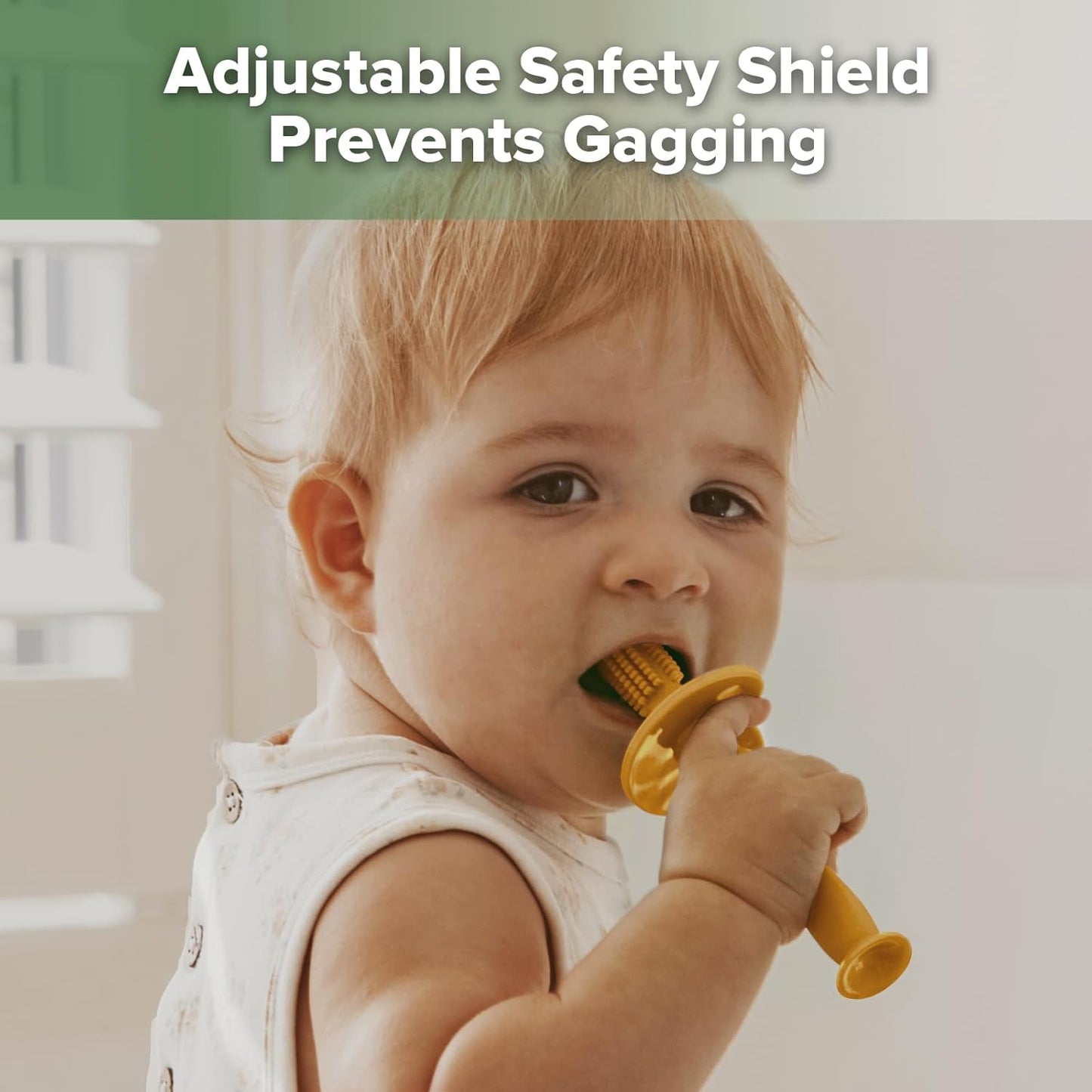 haakaa 360° Baby Toothbrush with Suction Base - Gentle Cleaning for Toddler's Self-Brushing Training, Food-Grade Silicone, Adjustable Safety Shield - Mustard (1 Piece)