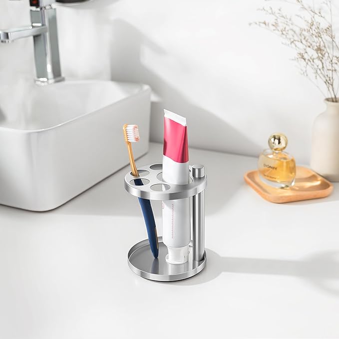 Stainless Toothbrush Holder Stand for Bathroom: Stainless Steel Ventilated Organizer with Slots for Electric Toothbrushes, Toothpaste, Razors & Small Comb, Unique Footprint Base Design, Brushed Silver
