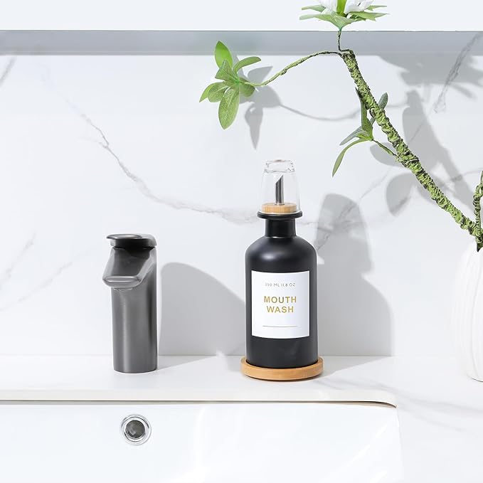 11.8OZ Glass Mouthwash Dispenser for Bathroom with Stainless Steel & Bamboo Nozzle, Mouthwash Cup Reusable, Bamboo Tray, and Elegant Gold Sticker.(Black)