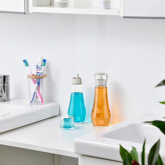 VITVITI Glass Mouthwash Dispenser for Bathroom, 8.8OZ Mouth Wash Container Bottle with Lid Cup, Small Clear Refillable Mouthwash Dispenser Decanter for Countertop, Set of 2