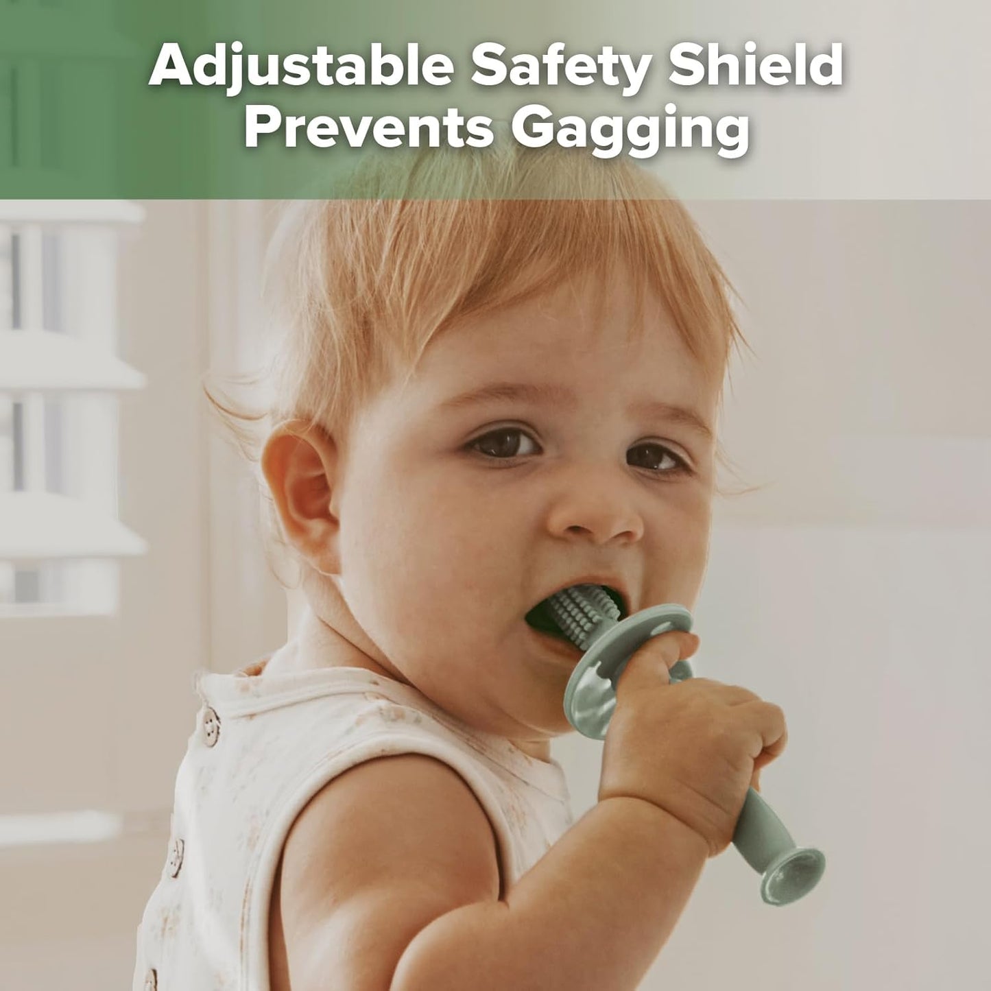 haakaa 360° Baby Toothbrush with Suction Base - Gentle Cleaning for Infant Self-Brushing Training, Food-Grade Silicone, Adjustable Safety Shield - Pea Green (1 Piece)