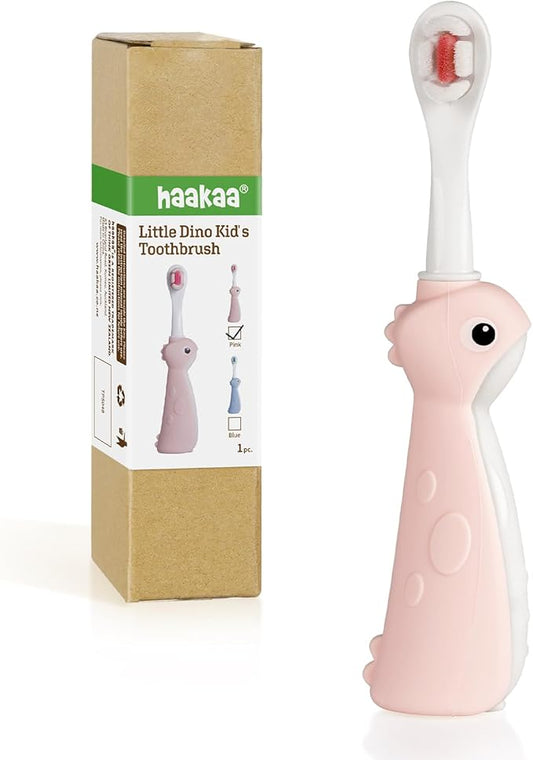 haakaa Dinosaur Toothbrush for Kids 2-4 – Soft Bristles Baby Toothbrush with Silicone Handle, Non-Slip Grip & Tongue Cleaner | BPA-Free, Fun Training for Toddlers - Pink, 1 Count