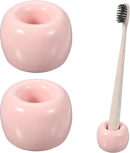 uxcell 2 Pcs Mini Ceramics Toothbrush Holder Stands, Sleek Mini Countertop Toothbrush Round Shape Ceramic Holder Stand for Bathroom Vanity Countertops, Pink