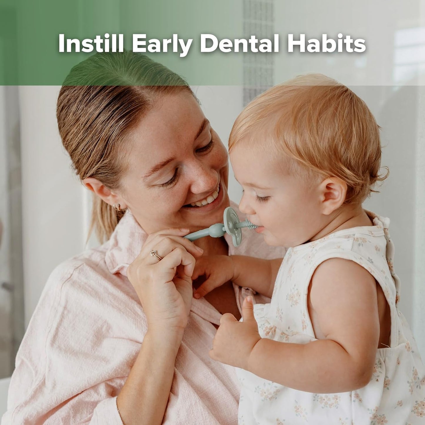 haakaa 360° Baby Toothbrush with Suction Base - Gentle Cleaning for Infant Self-Brushing Training, Food-Grade Silicone, Adjustable Safety Shield - Pea Green (1 Piece)