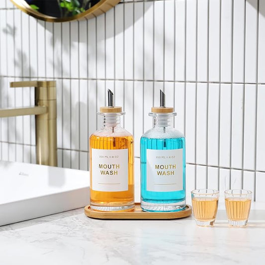 11.8OZ Glass Mouthwash Dispenser for Bathroom with Stainless Steel & Bamboo Nozzle, Mouthwash Cup Reusable, Bamboo Tray, and Elegant Gold Sticker.Set of 2（Clear