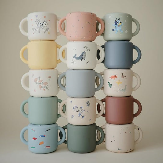 mushie Silicone Snack Cup | Spill Proof Food Container for Toddler and Baby (Dinosaurs)