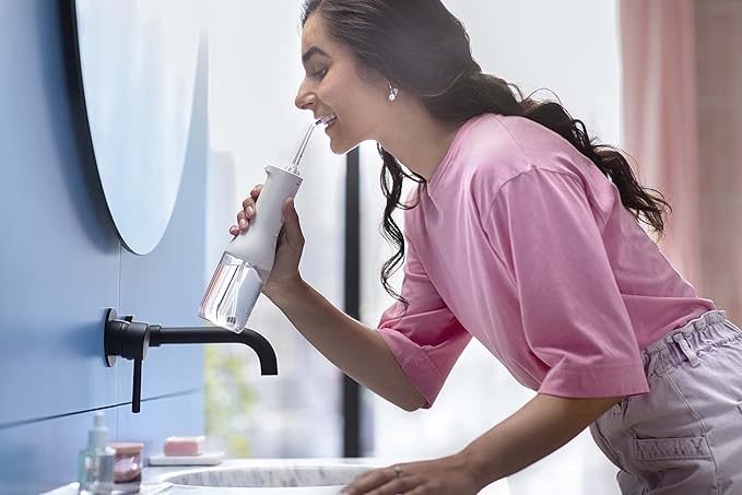 Philips Sonicare Water Flosser Cordless – Rechargeable Power Dental Waterflosser for Teeth, Portable Oral Irrigator with 3 Intensity Settings, 360° Rotating Nozzle – (Mint)