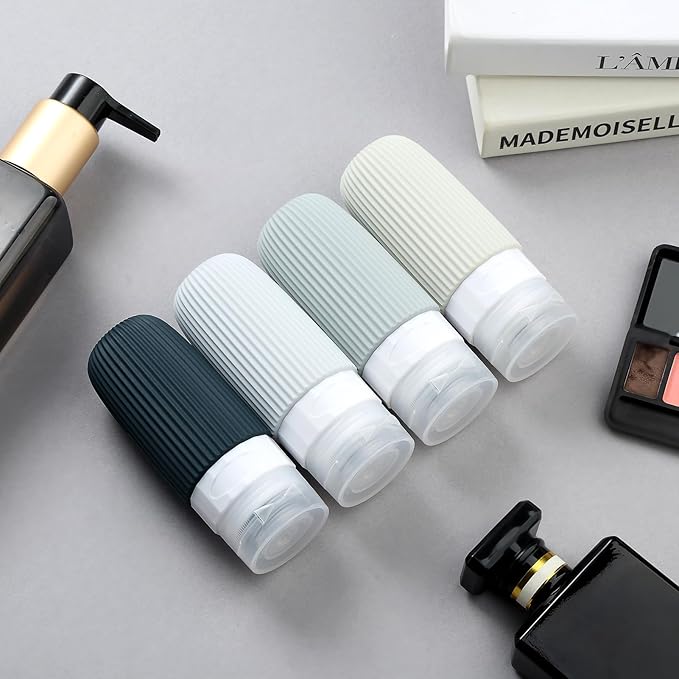 Travel Bottles for Toiletries, Tsa Approved 2oz Travel Bottles, BPA Free Leak Proof Travel Size Toiletry Containers, Refillable Travel Accessories with Toiletry Bag for Shampoo Liquid (4 Pack)